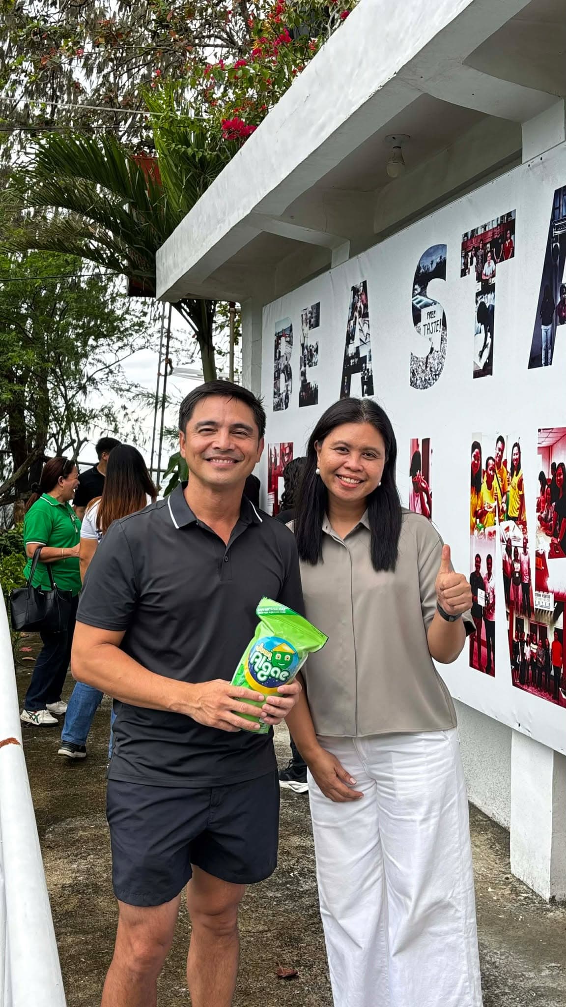 Community partner holding Juan Algae Paste
